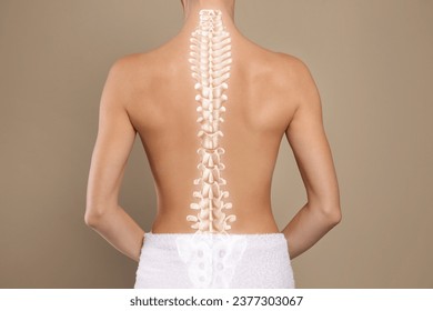 Woman with healthy back on beige background, closeup. Illustration of spine - Powered by Shutterstock