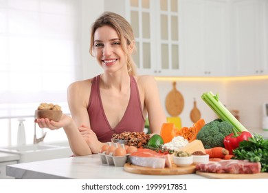 Woman With Healthy Food In Kitchen. Keto Diet