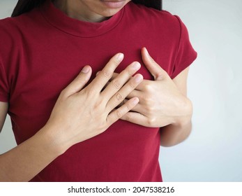 Woman Heart Attack Symptom. Closeup Photo, Blurred.