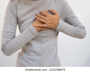 Woman Heart Attack Symptom. Closeup Photo, Blurred.