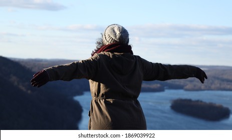 Woman With Her Arms Stretched Out Looking Of The Beautiful View Of The Susquehanna River From Pinnacle Overlook In Holtwood Pennsylvania