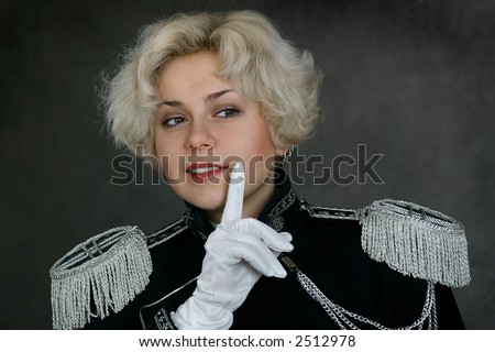 woman with her finger near the face