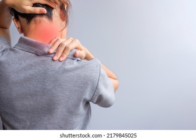 Woman With Her Neck Sprain, Muscle Painful During Overwork. Girl Having Body Problem After Wake Up. Stiff Neck, Office Syndrome And Ergonomic Concept