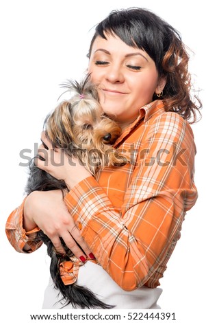 woman with her pet Yorkshire terrier on a white background