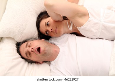 A Woman With Her Snoring Husband
