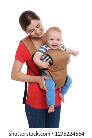 Woman With Her Son In Baby Carrier On White Background