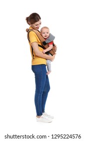 Woman With Her Son In Baby Carrier On White Background