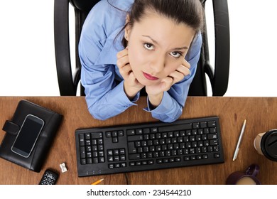 Woman At Hers Desk Not Looking Happy Shot From A Birds Eye View