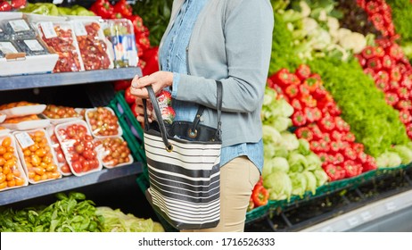 Woman Hides Strawberries In Her Handbag While Shoplifting In The Supermarket