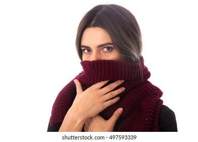 Woman Hiding Mouth Under Scarf