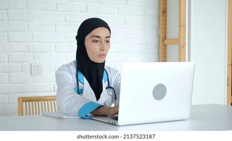 A Woman In A Hijab Is Undergoing Online Training To Improve Her Qualifications As A Doctor. Medical Education In Muslim Countries. The Future Doctor Is Recording A Lecture On Treatment.