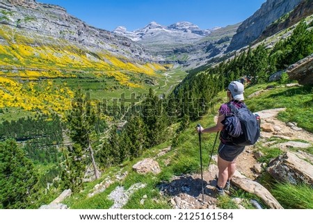 Woman hiker in the Ordesa and Monte Perdido National Park, Aragon, Huesca, Spain.