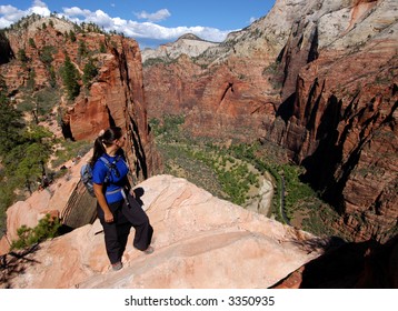 Woman Hiking Angels Landing In Zion National Park