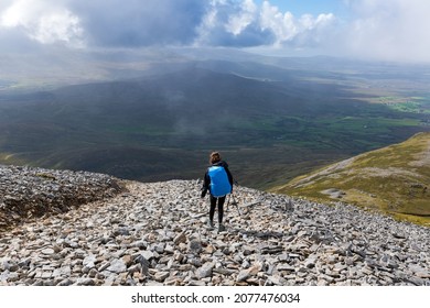 Woman Hiking Down Croagh Patrick, County Mayo, Ireland