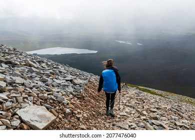 Woman Hiking Down Croagh Patrick, County Mayo, Ireland