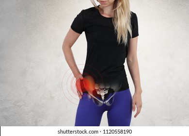 Woman with hip joint pain. Sport exercising injury