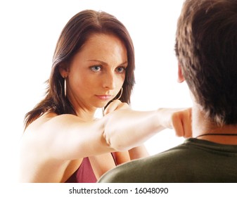 Woman Hitting Guy With Fist