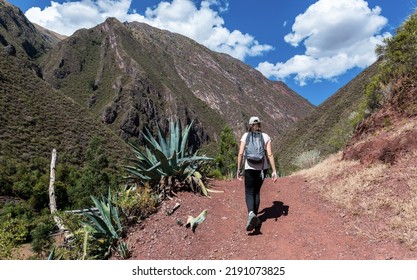 Woman hking on an old inca pas near Chinchero, Cuzco region, Peru - Shutterstock ID 2191073825