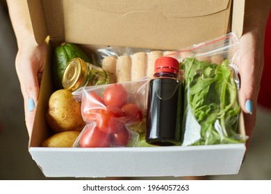 Woman Hold In Hand  Food Box Meal Kit Of Fresh Ingredients Order From A Meal Kit Company, Delivered, Cooking At Home.