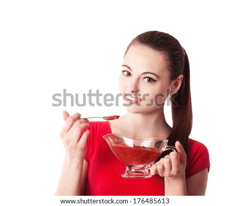 Woman holding ar hot sauce  isolated on white