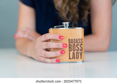 Woman Holding 'Badass Boss Lady' Flash With Red Pink Nails