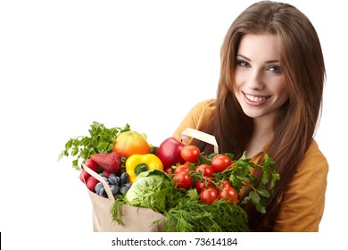 Woman Holding A Bag Full Of Healthy Food. Shopping .