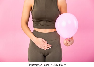 Woman Holding A Balloon, Feeling Bloated Concept, Woman Having Abdominal Pain Isolated On White