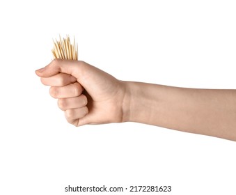 Woman holding bamboo toothpicks on white background