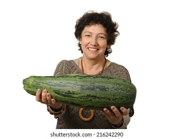 Woman Holding Big Courgette (zucchini)