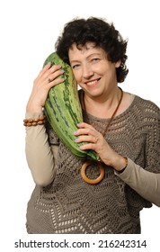 Woman Holding Big Courgette (zucchini)