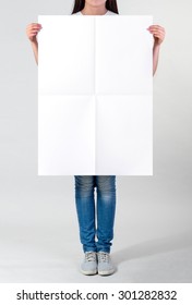 Woman Holding A Blank A1 Poster