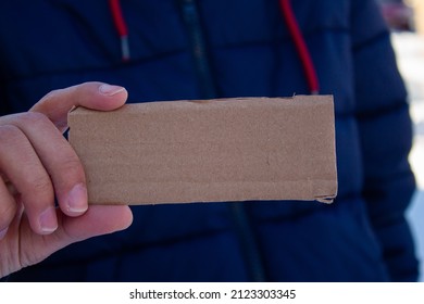 Woman Holding Blank Cardboard Box. Empty Card With Copy Space.