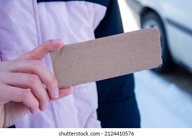 Woman Holding Blank Cardboard Box. Empty Card With Copy Space.