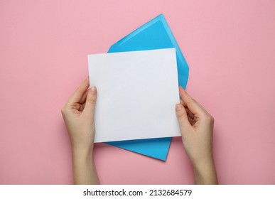 Woman Holding Blank Letter On Pink Background, Top View