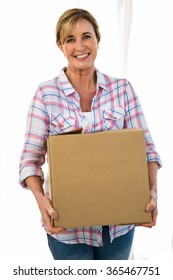 Woman Holding A Box Smiling