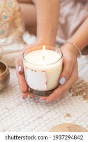 Woman Holding A Burning Candle