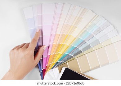 Woman Holding Color Samples Palette Design Catalog.