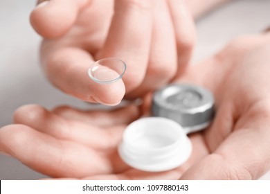 Woman Holding Contact Lens And Case, Closeup