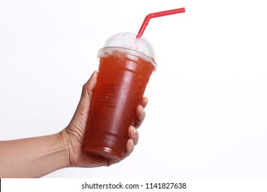 Woman Holding A Cup Of Iced Tea