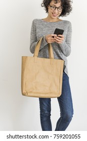Woman Holding Design Space Leather Tote Bag
