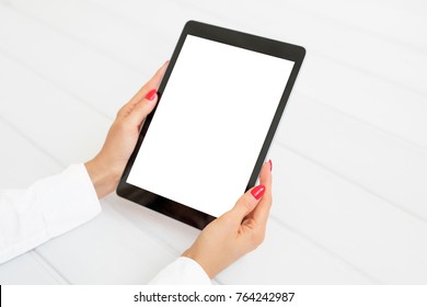 Woman Holding Digital Tablet In Vertical Position. Screen Mockup.