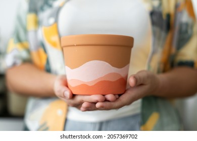 Woman Holding DIY Painted Pot Painting