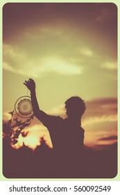 Woman Holding Dream Catcher