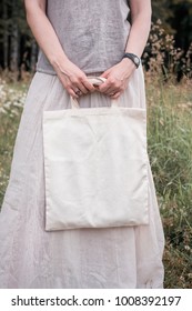 Woman Holding Empty Linen Bag Outdoor. Template Mock Up