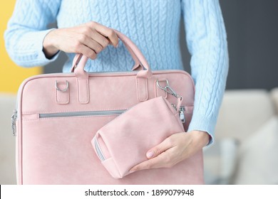 Woman Holding Fashionable Pink Laptop Bag Closeup. Sale Of Accessories Concept