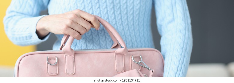 Woman Holding Fashionable Pink Laptop Bag Closeup