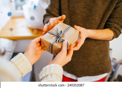 Woman Holding Gift Box Gesture Giving Stock Photo (Edit Now) 240352087