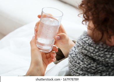 Woman Holding Glass With Water With Soluble Tablet