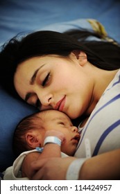 Woman Holding Her 2 Days Old Newborn Baby