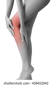 Woman Holding Her Beautiful Healthy Long Leg With Massaging Calf And Knee In Pain Area Black And White Color With Red Highlighted, Isolated On White Background.